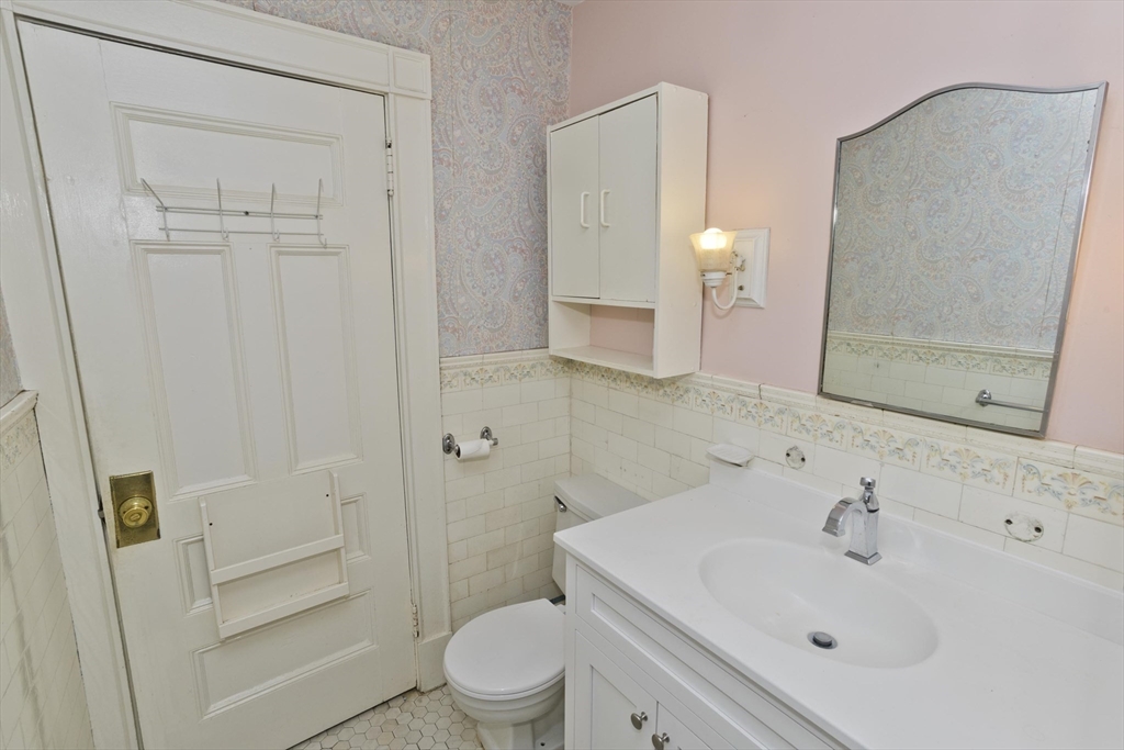 128 Maplewood Terrace Springfield, MA 01108 - Photo 24 of 40 a bathroom with a sink a toilet and shower