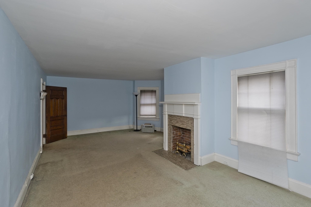 128 Maplewood Terrace Springfield, MA 01108 - Photo 30 of 40 an empty room with fireplace