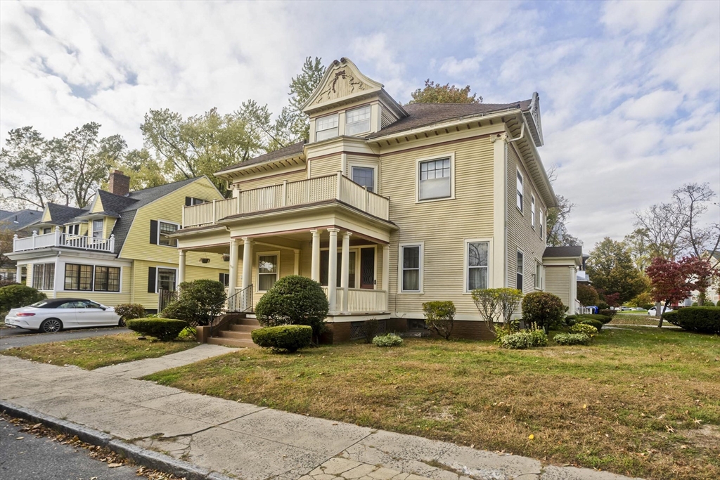 128 Maplewood Terrace Springfield, MA 01108 - Photo 3 of 40 a front view of a house with garden