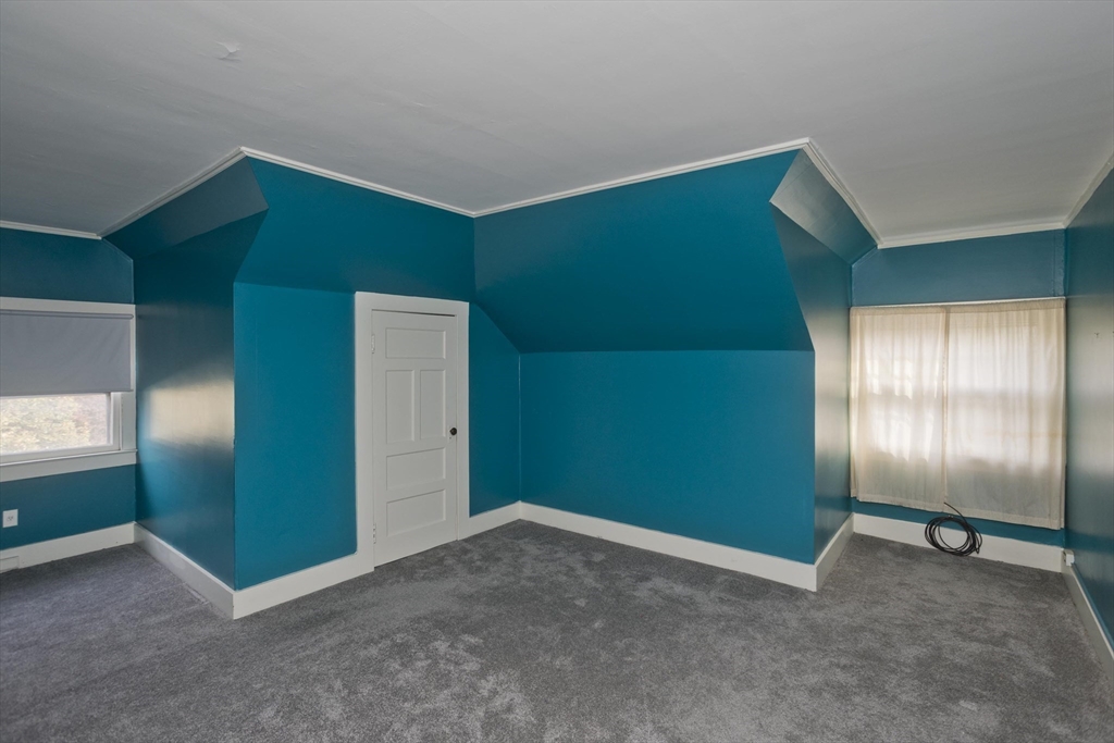 128 Maplewood Terrace Springfield, MA 01108 - Photo 36 of 40 an empty room with windows and closet