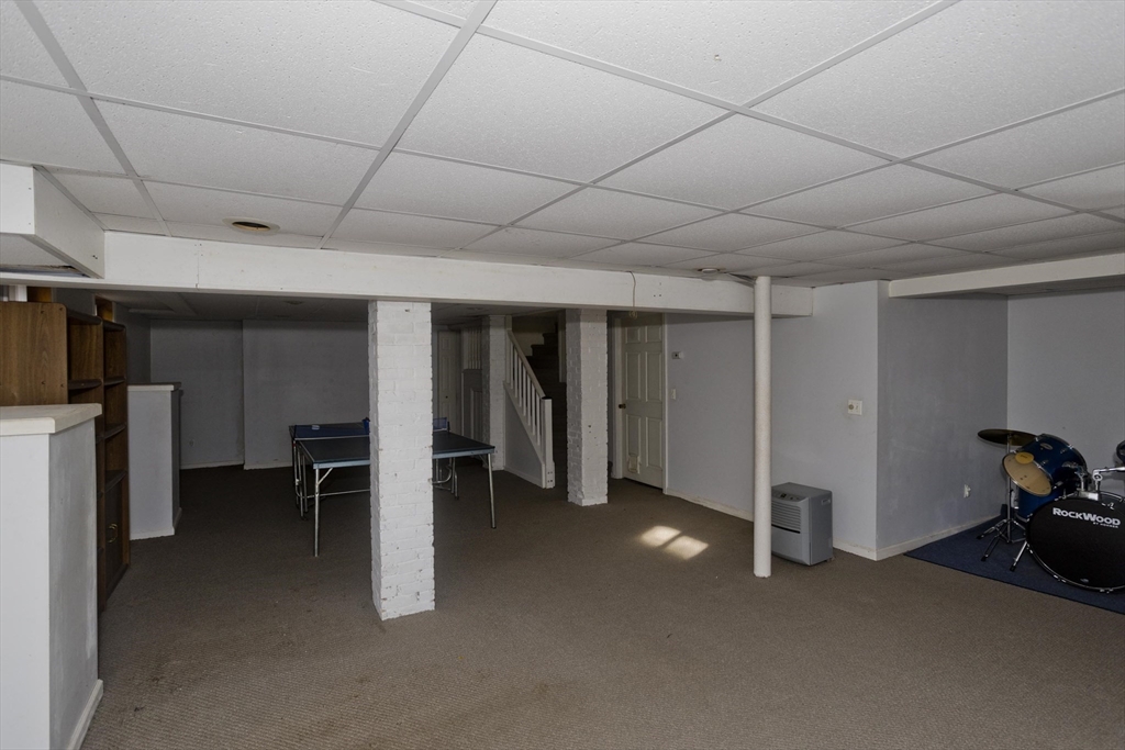 128 Maplewood Terrace Springfield, MA 01108 - Photo 40 of 40 a view of a livingroom with furniture and a refrigerator