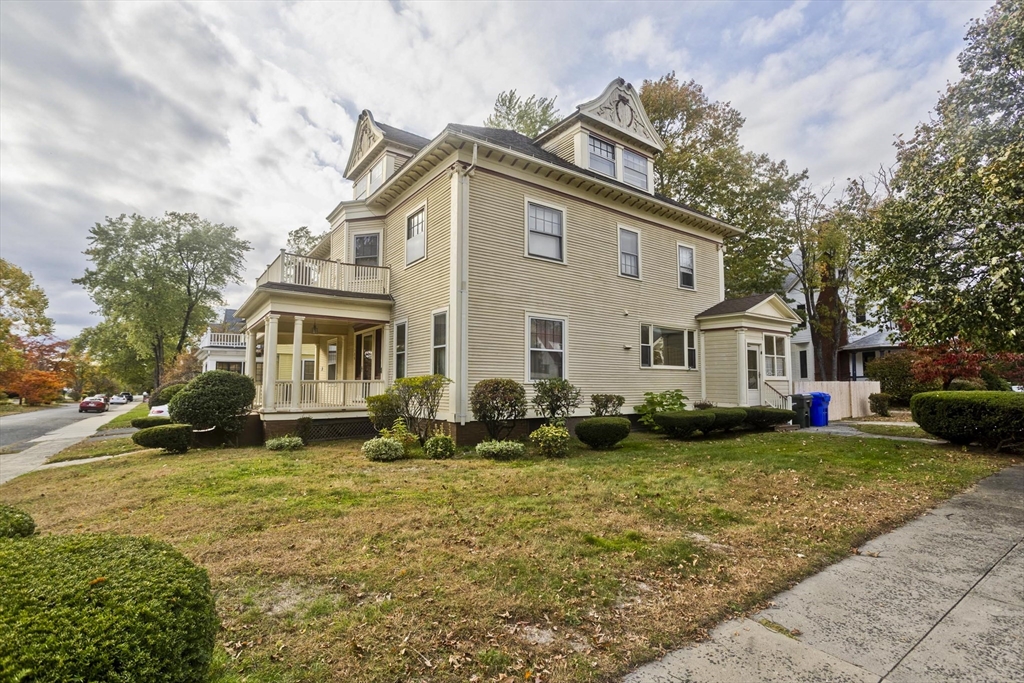 128 Maplewood Terrace Springfield, MA 01108 - Photo 4 of 40 a view of a house with a yard