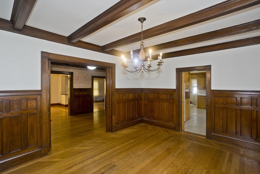 128 Maplewood Terrace Springfield, MA 01108 - Photo 10 of 40 a view of a livingroom with a chandelier