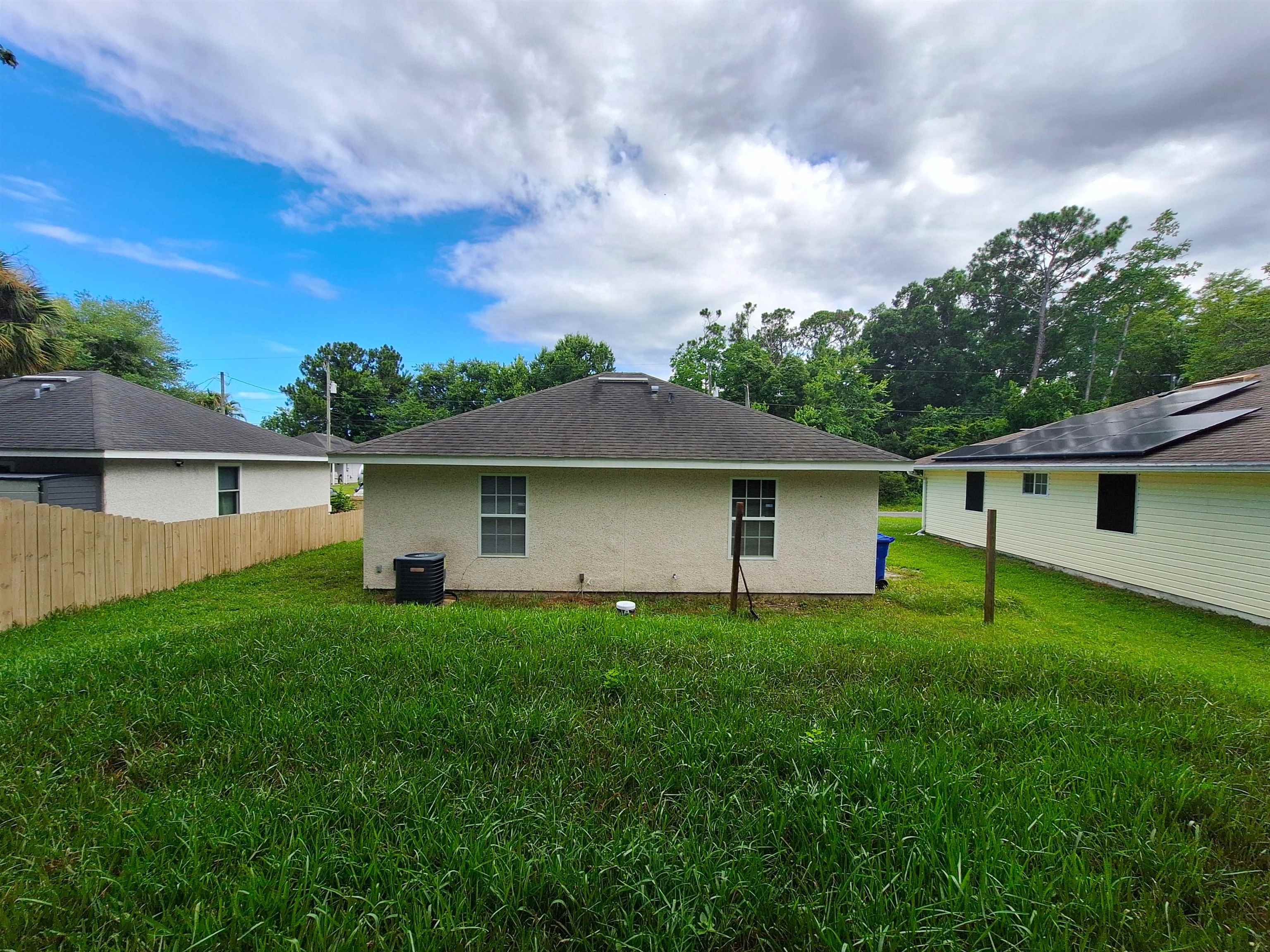 870 13th Street St. Augustine, FL 32084 - Photo 22 of 28 a view of a house with a yard