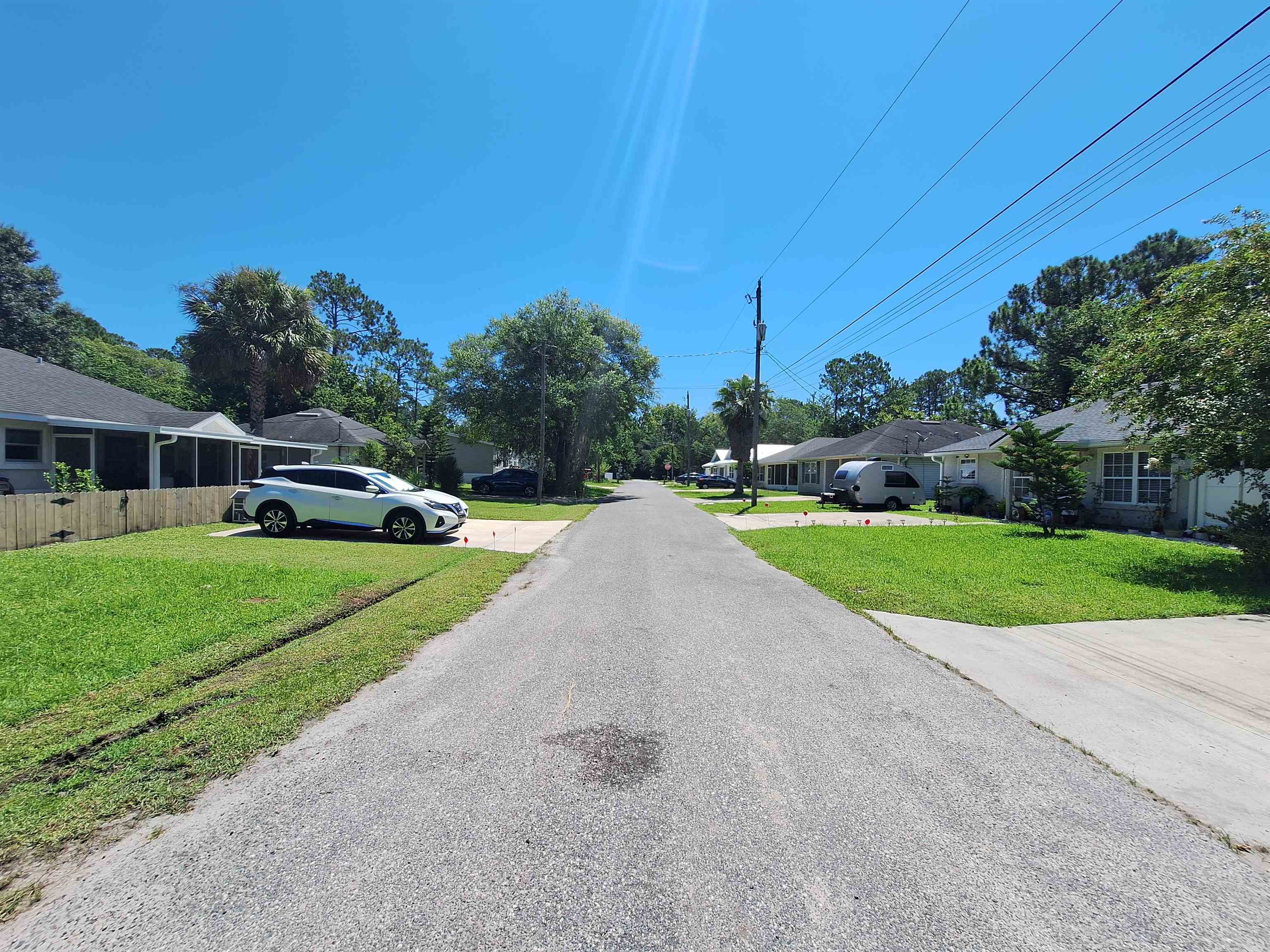 870 13th Street St. Augustine, FL 32084 - Photo 25 of 28 a front view of a house with a yard