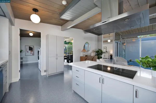 a workspace with furniture and wooden floor