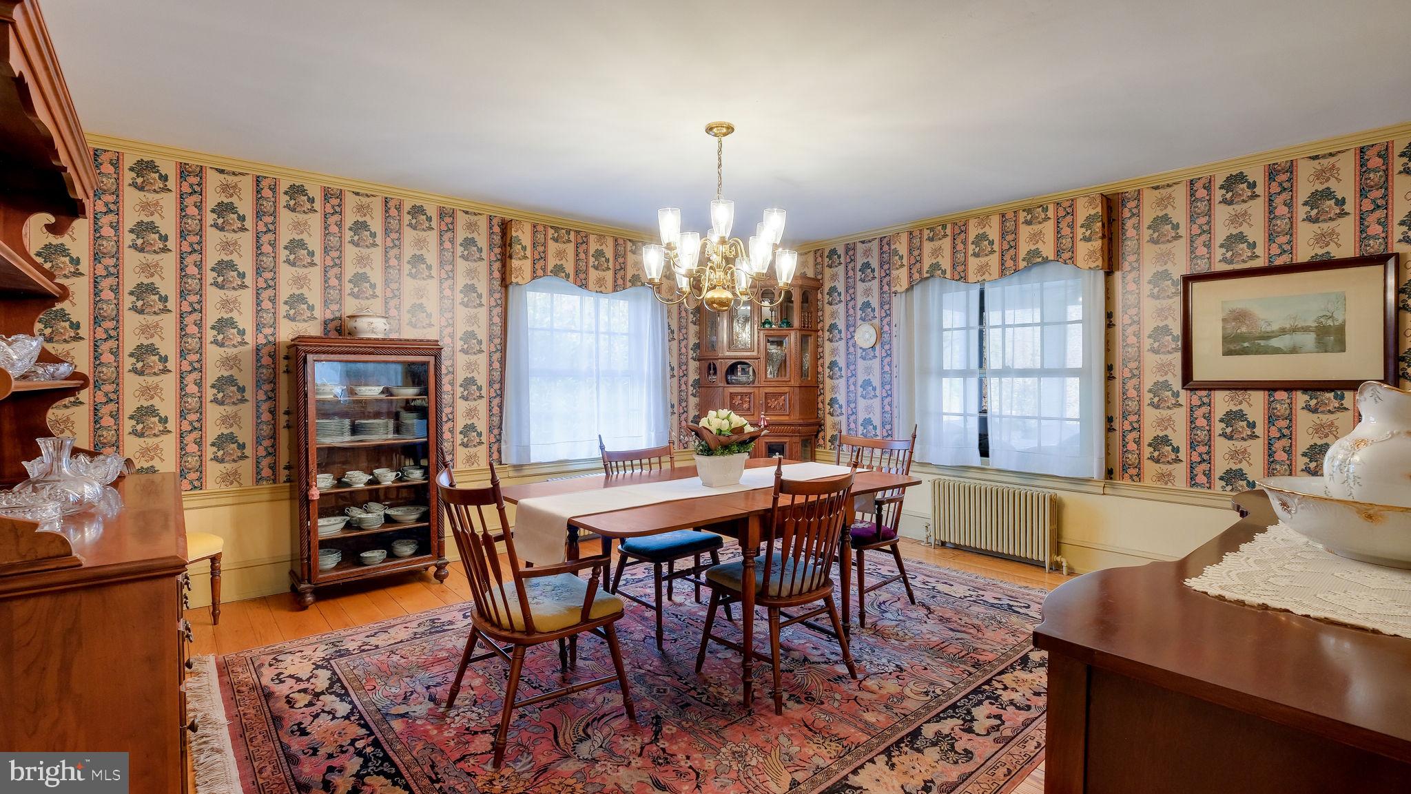 563 Pebble Hill Road Doylestown, PA 18901 - Photo 15 of 81 a view of a dining room with furniture and chandelier