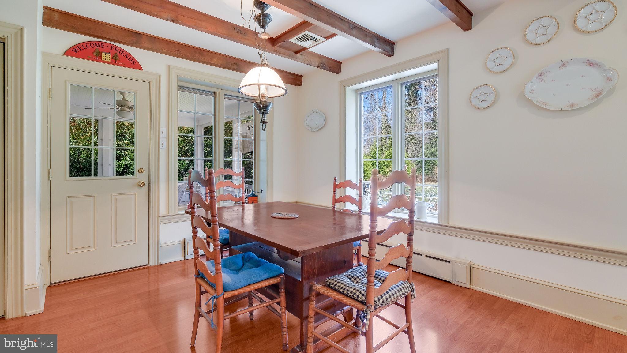 563 Pebble Hill Road Doylestown, PA 18901 - Photo 18 of 81 a view of a dining room with furniture window and outside view