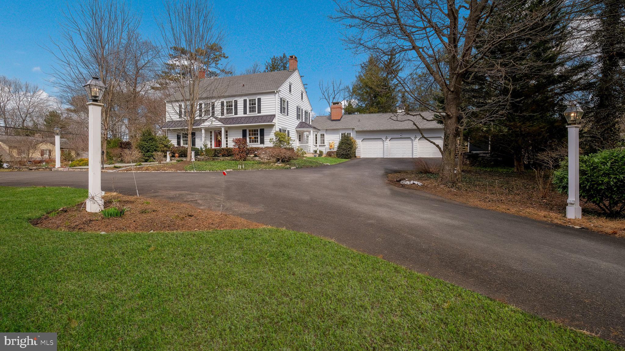 563 Pebble Hill Road Doylestown, PA 18901 - Photo 2 of 81 a front view of a house with a yard and tree s