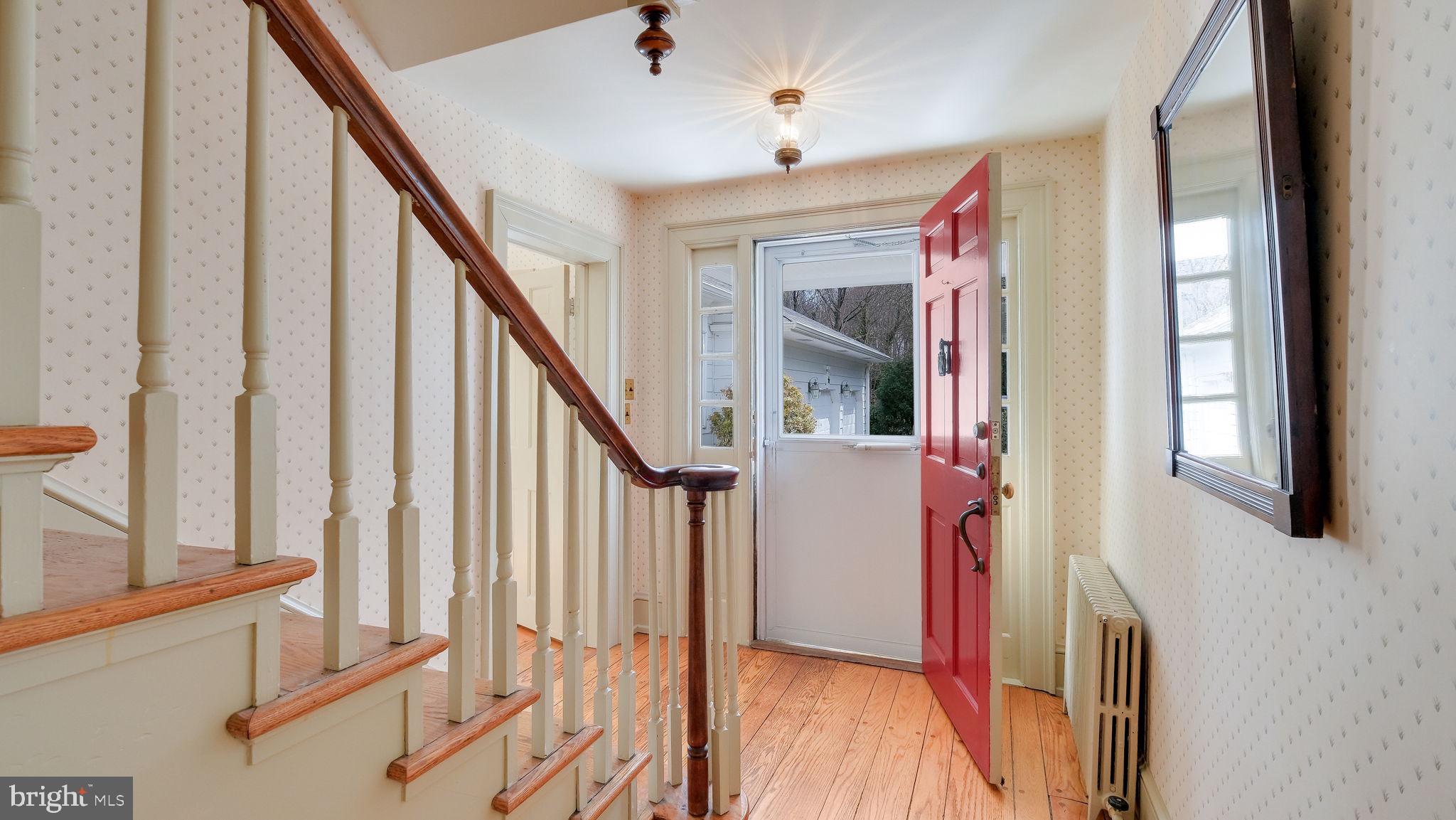 563 Pebble Hill Road Doylestown, PA 18901 - Photo 33 of 81 a view of an entryway with wooden floor and stair