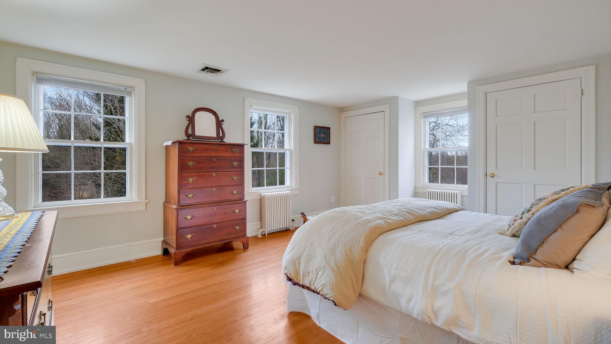 563 Pebble Hill Road Doylestown, PA 18901 - Photo 36 of 81 a bedroom with a bed and a window