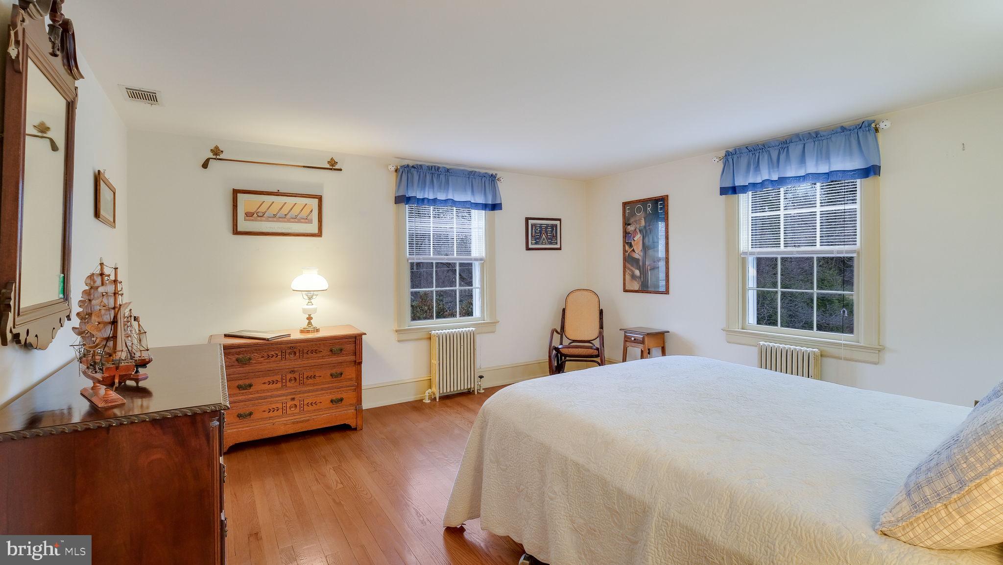 563 Pebble Hill Road Doylestown, PA 18901 - Photo 43 of 81 a bedroom with a bed and furniture