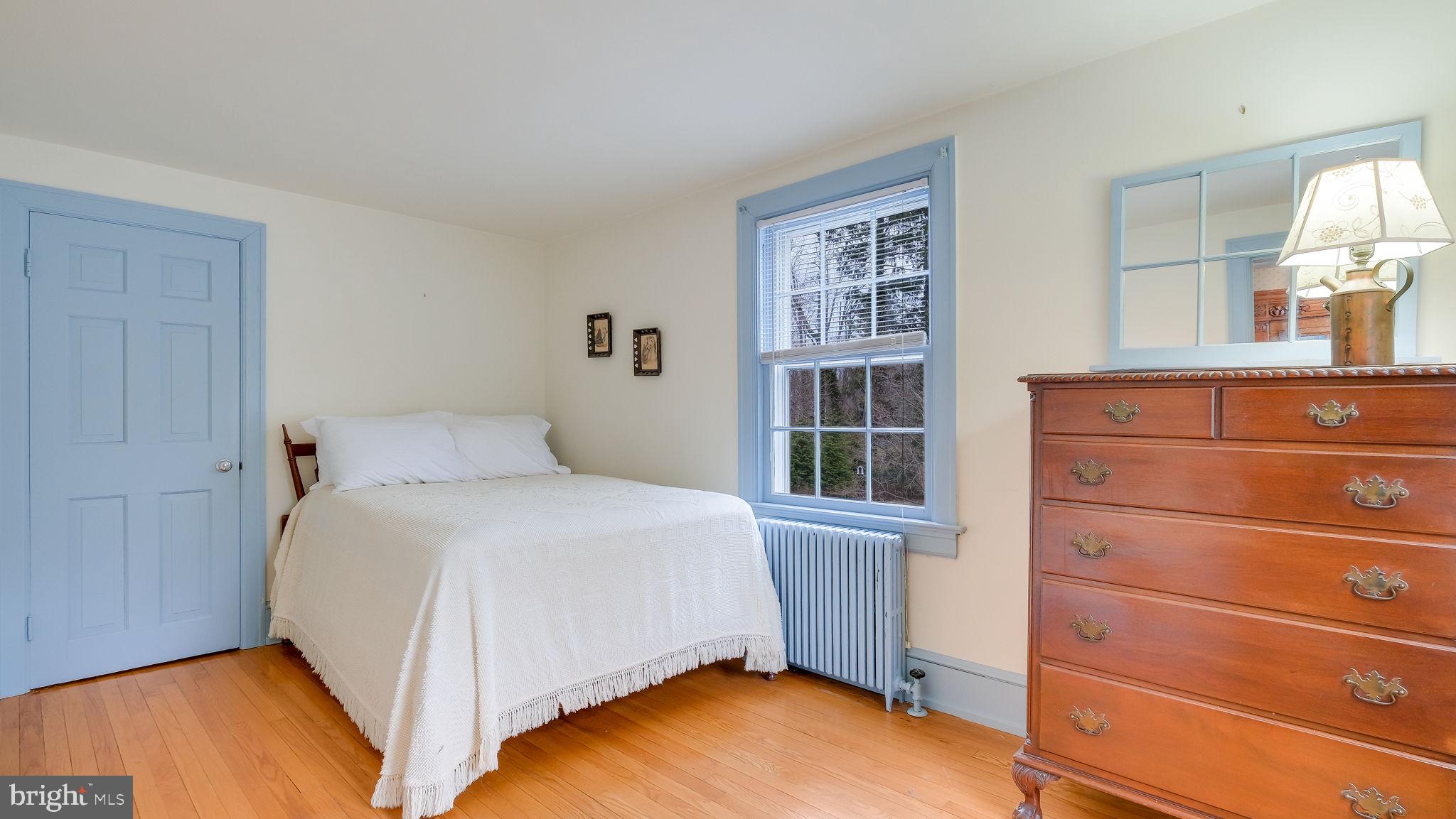 563 Pebble Hill Road Doylestown, PA 18901 - Photo 45 of 81 a bedroom with a bed and a window