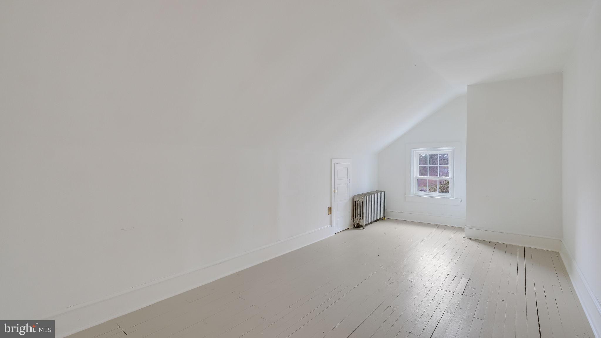 563 Pebble Hill Road Doylestown, PA 18901 - Photo 48 of 81 a view of a room with wooden floor and window