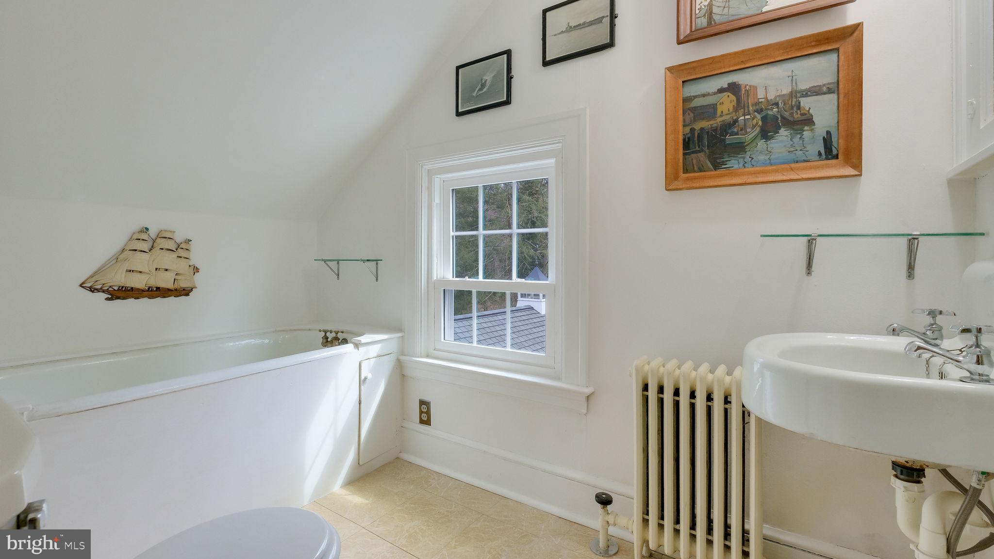 563 Pebble Hill Road Doylestown, PA 18901 - Photo 50 of 81 a bathroom with a sink and a bathtub