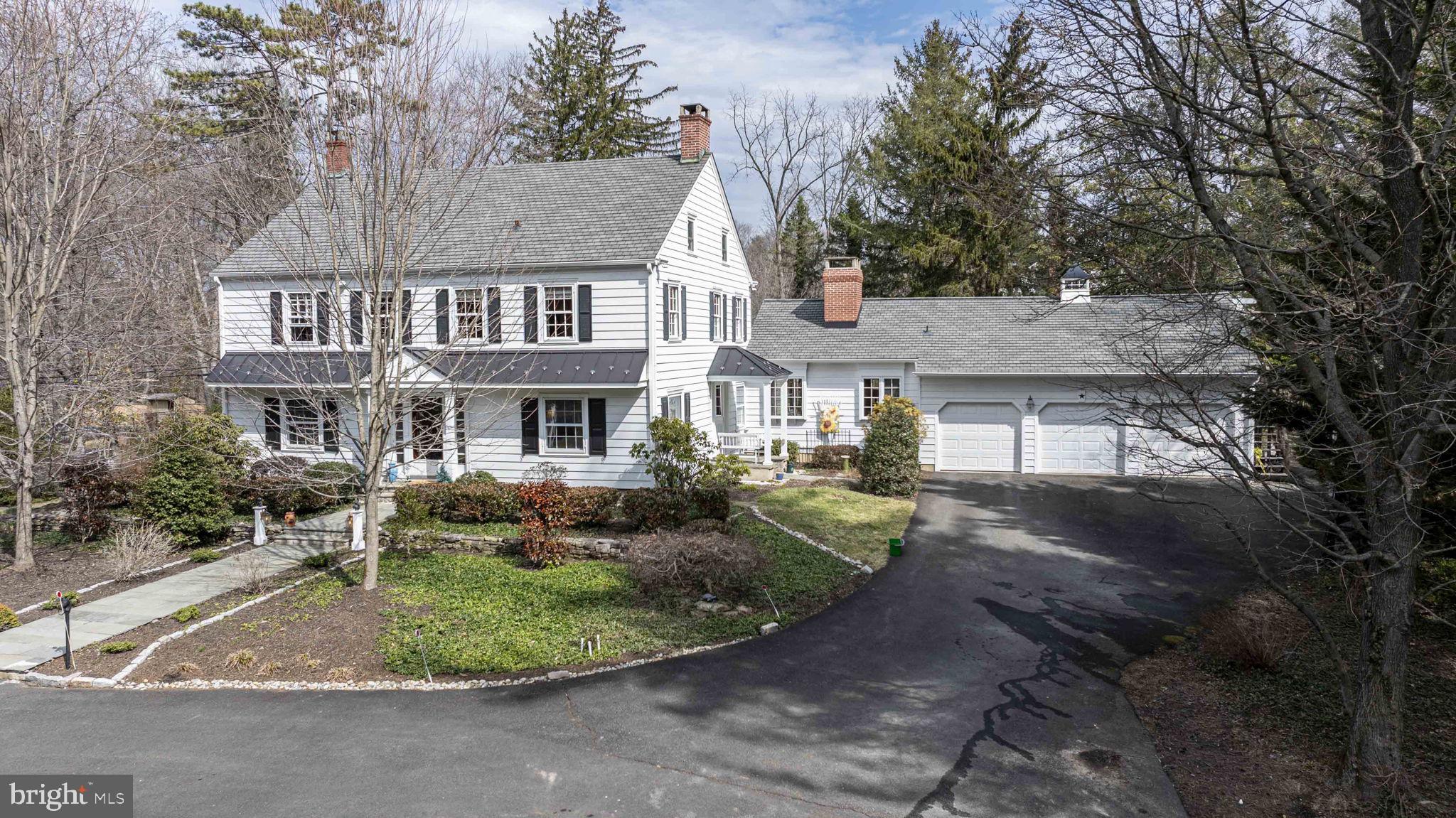563 Pebble Hill Road Doylestown, PA 18901 - Photo 59 of 81 a front view of a house with a yard and trees
