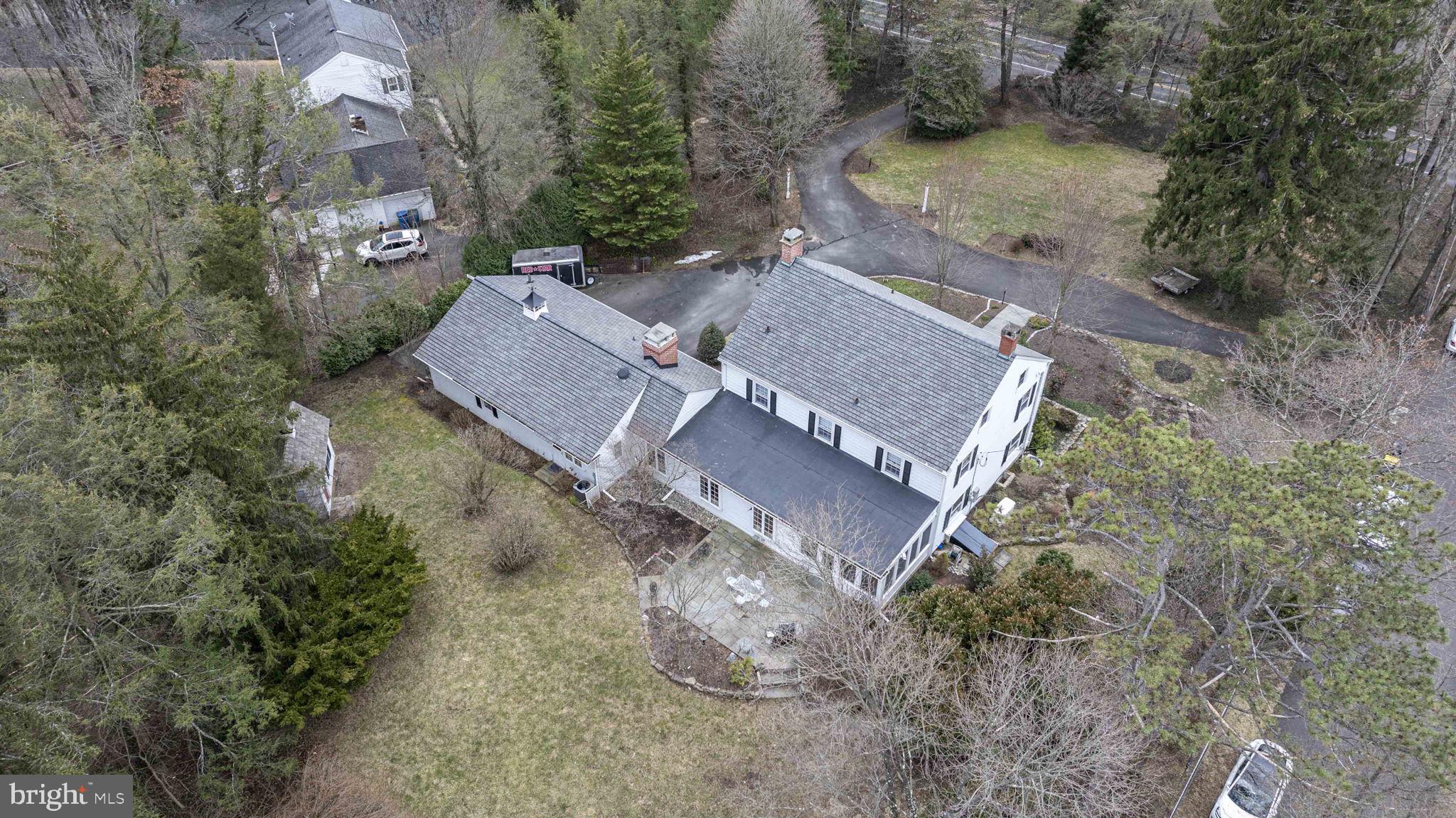 563 Pebble Hill Road Doylestown, PA 18901 - Photo 65 of 81 an aerial view of a house with a yard and street