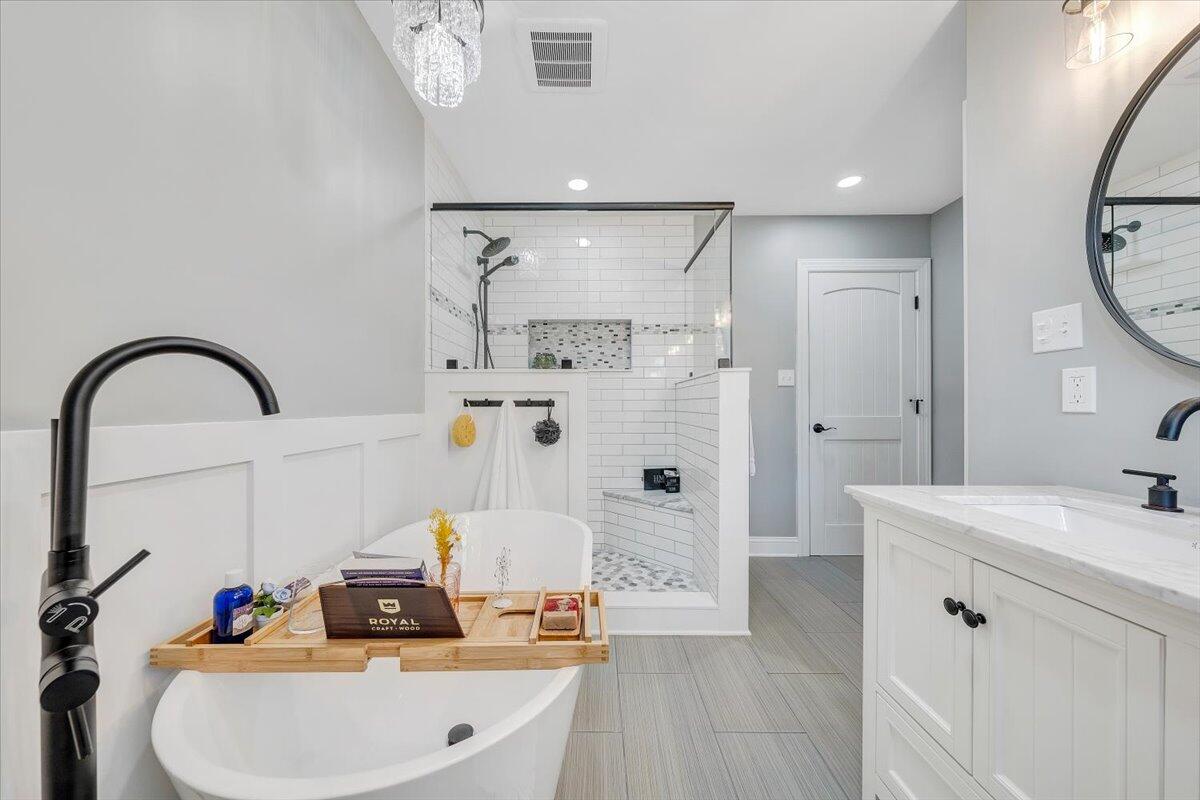 155 Mallard Cove Road Moneta, VA 24121 - Photo 22 of 51 a bathroom with a sink and a mirror