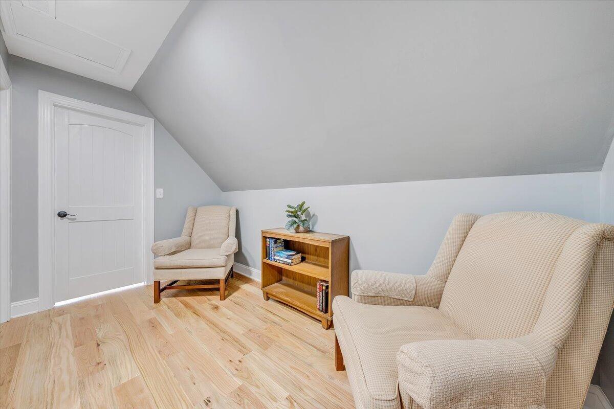 155 Mallard Cove Road Moneta, VA 24121 - Photo 23 of 51 a living room with furniture and a wooden floor
