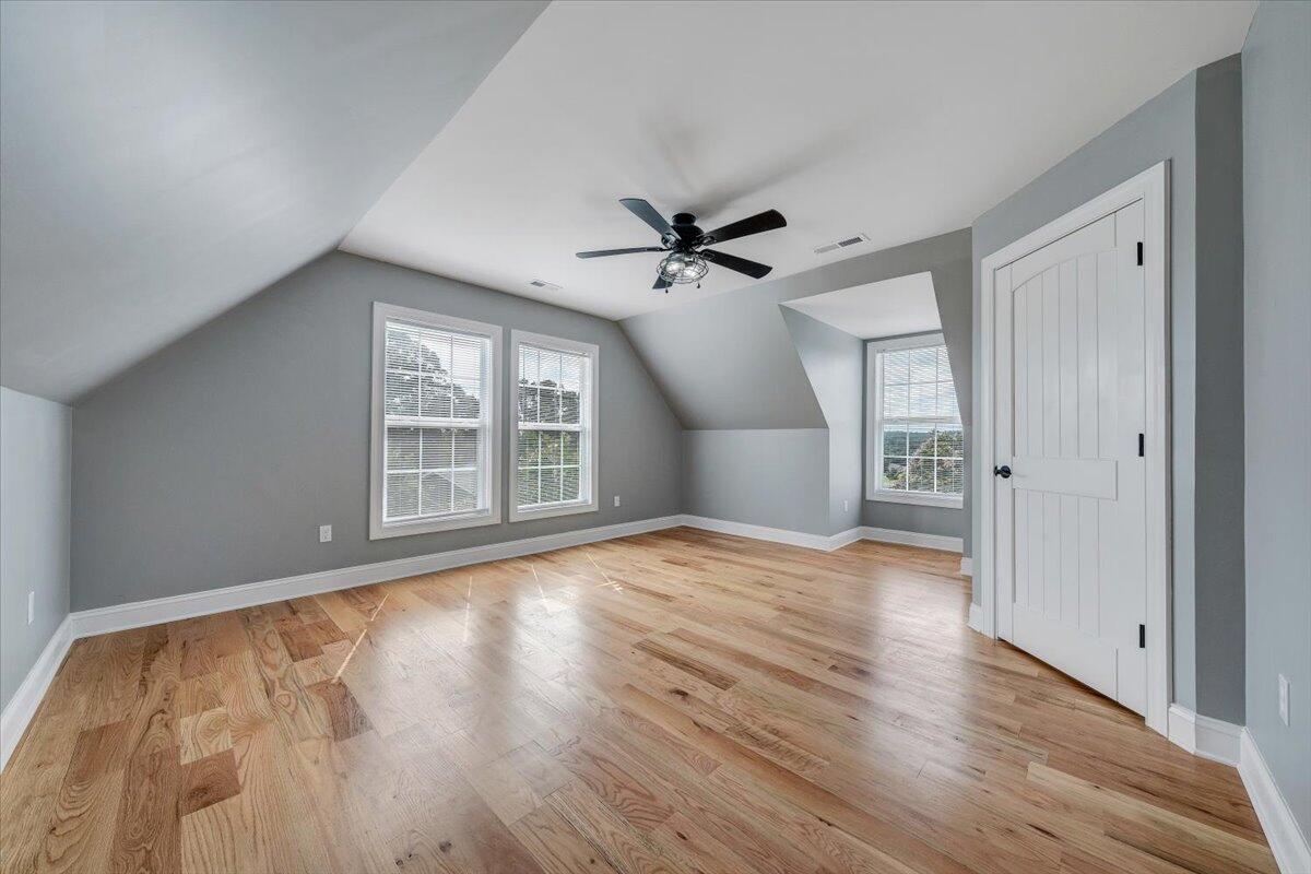 155 Mallard Cove Road Moneta, VA 24121 - Photo 26 of 51 a view of an empty room with a window and wooden floor