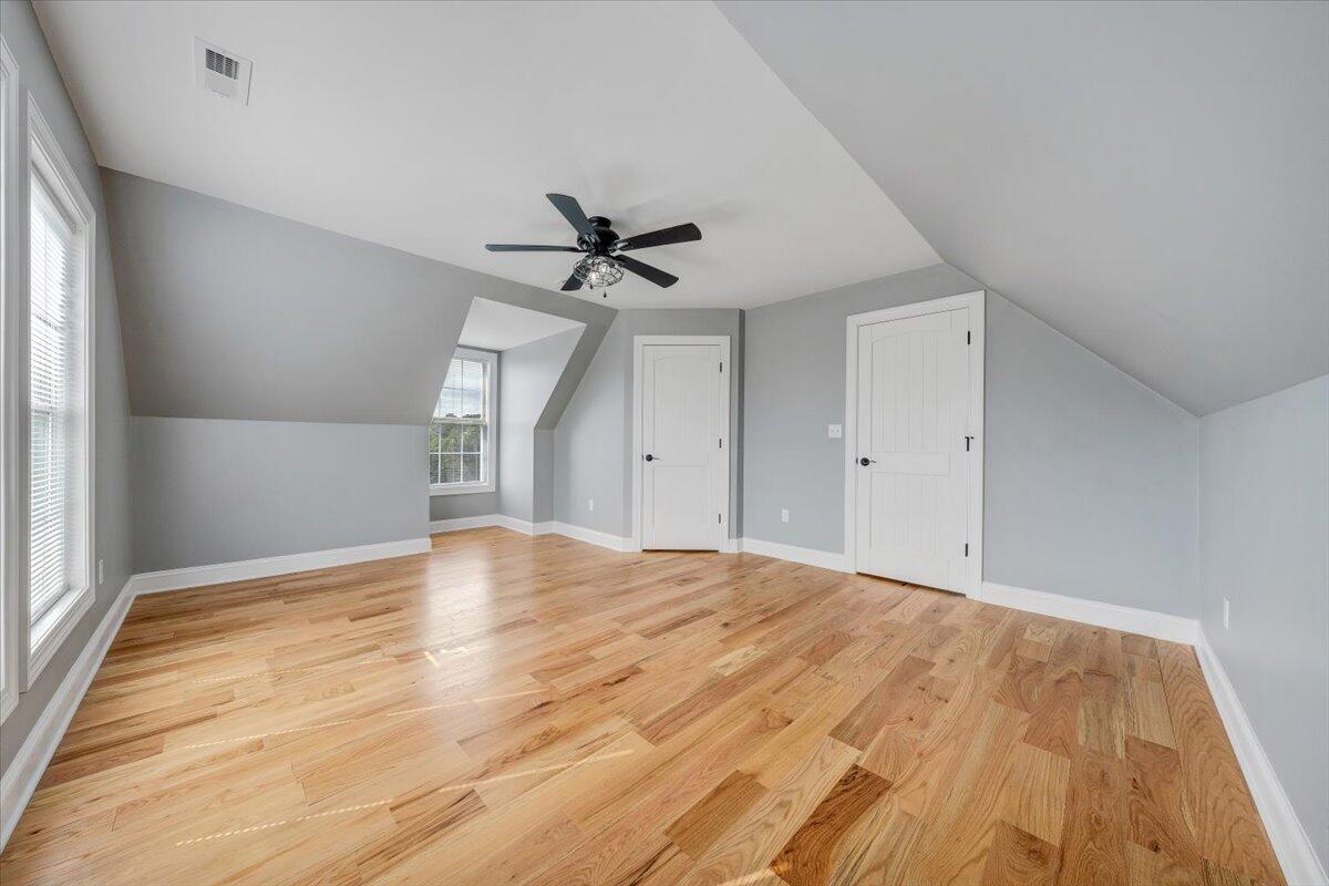 155 Mallard Cove Road Moneta, VA 24121 - Photo 27 of 51 a view of empty room with wooden floor and fan