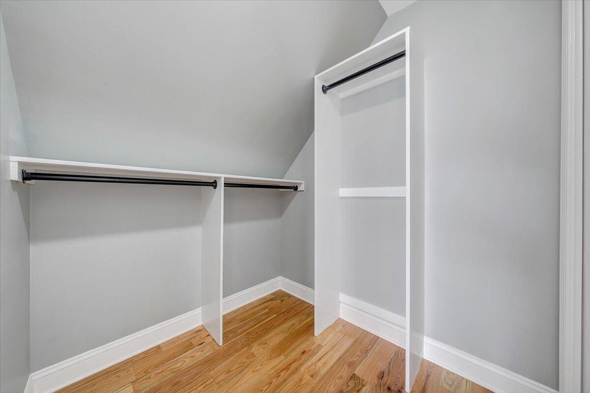 155 Mallard Cove Road Moneta, VA 24121 - Photo 28 of 51 a view of walk in closet with wooden floor