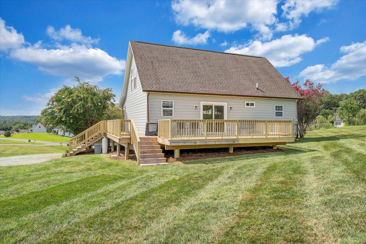 155 Mallard Cove Road Moneta, VA 24121 - Photo 36 of 51 a view of a house with a yard