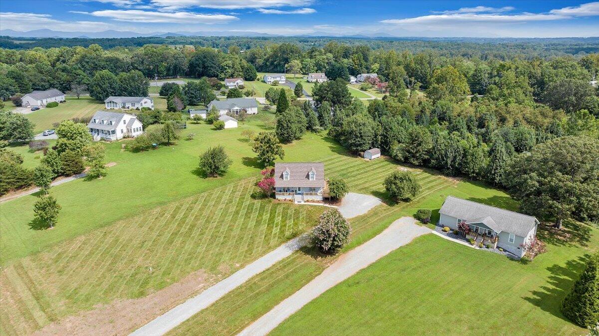 155 Mallard Cove Road Moneta, VA 24121 - Photo 40 of 51 a view of a garden with an outdoor space