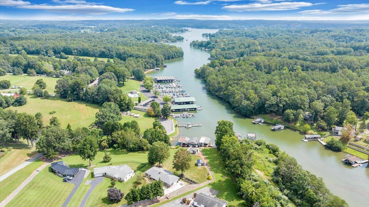 155 Mallard Cove Road Moneta, VA 24121 - Photo 45 of 51 an aerial view of green landscape with trees houses and mountain view