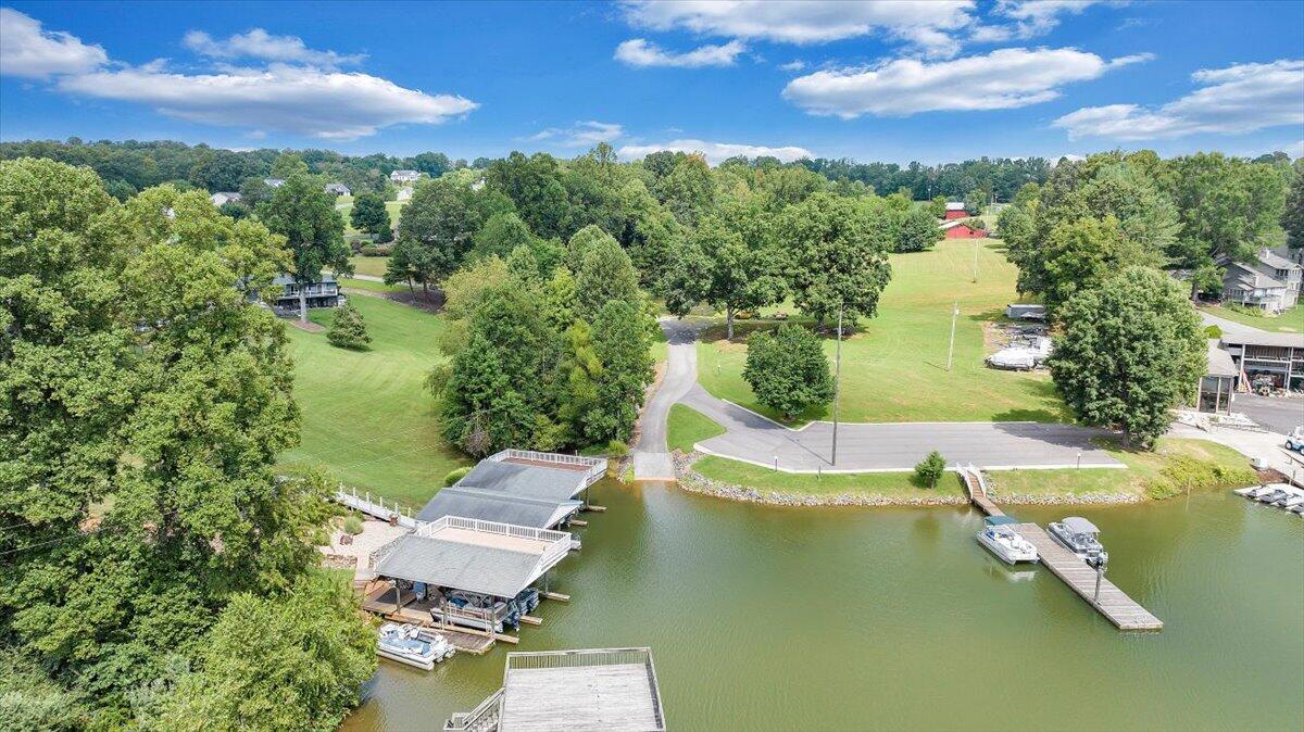155 Mallard Cove Road Moneta, VA 24121 - Photo 46 of 51 an aerial view of a house with swimming pool outdoor seating and yard