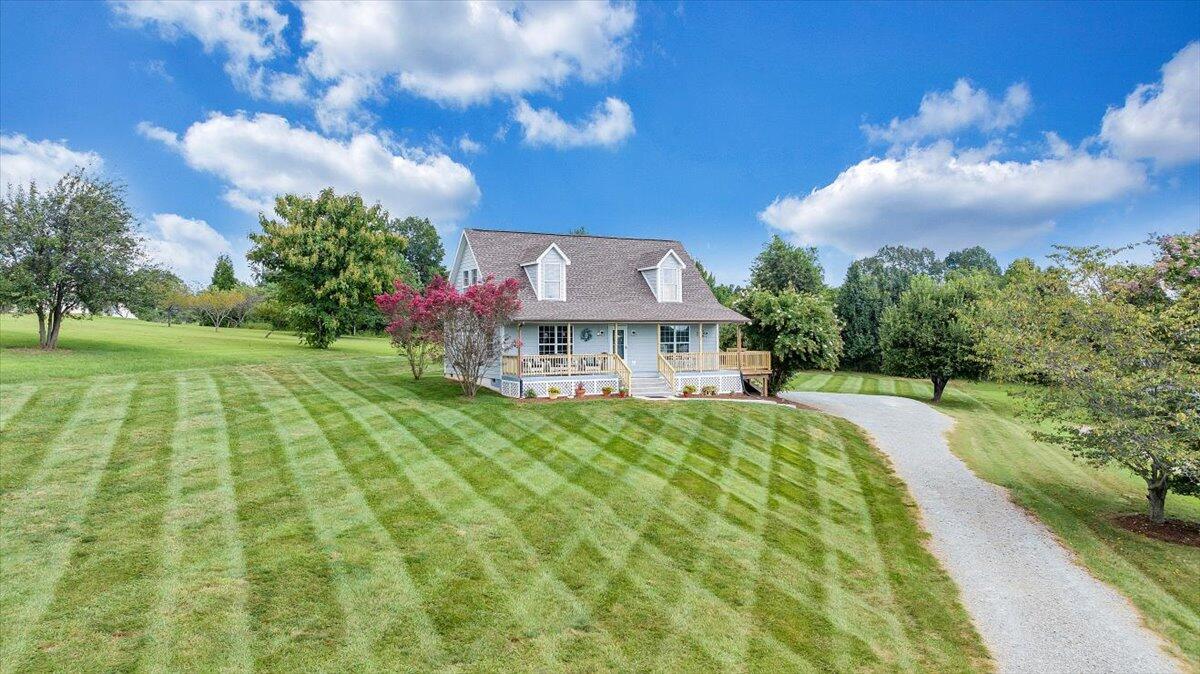 155 Mallard Cove Road Moneta, VA 24121 - Photo 48 of 51 a view of a house with a big yard plants and large trees