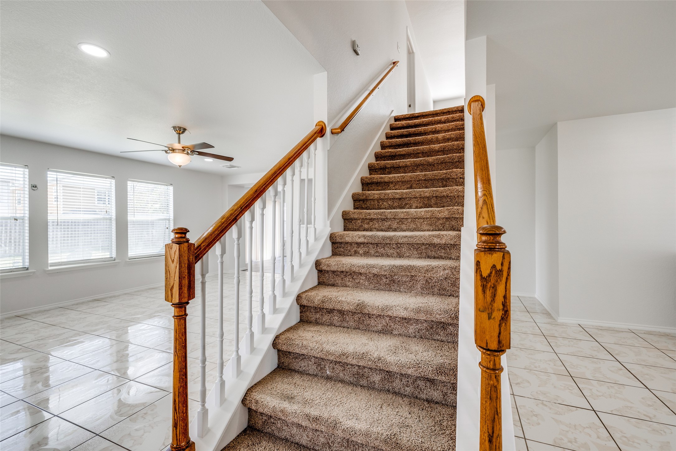 5750 Roehampton Court Houston, TX 77084 - Photo 14 of 25 a view of entryway and hall with wooden floor