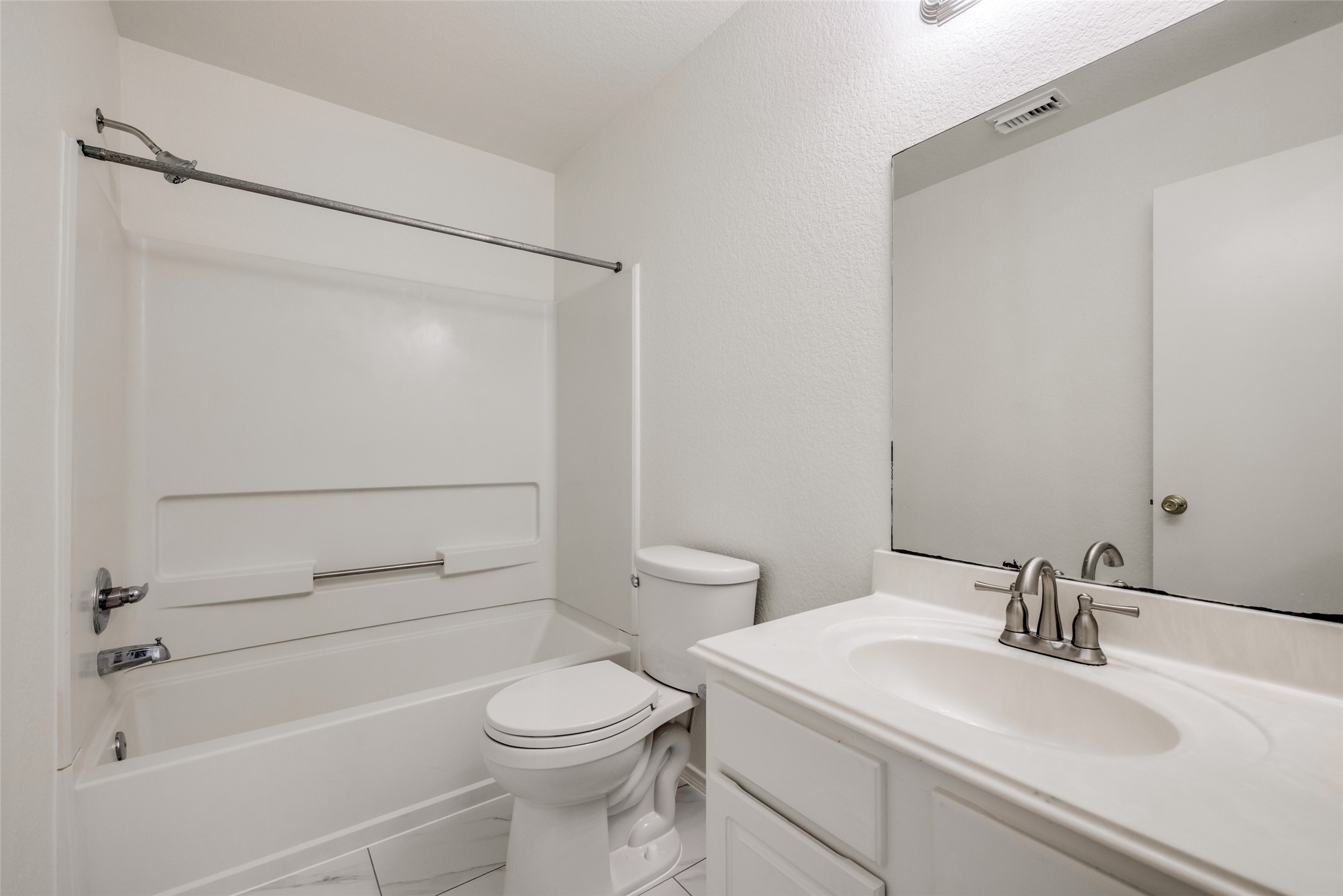 5750 Roehampton Court Houston, TX 77084 - Photo 21 of 25 a bathroom with a sink a toilet and shower