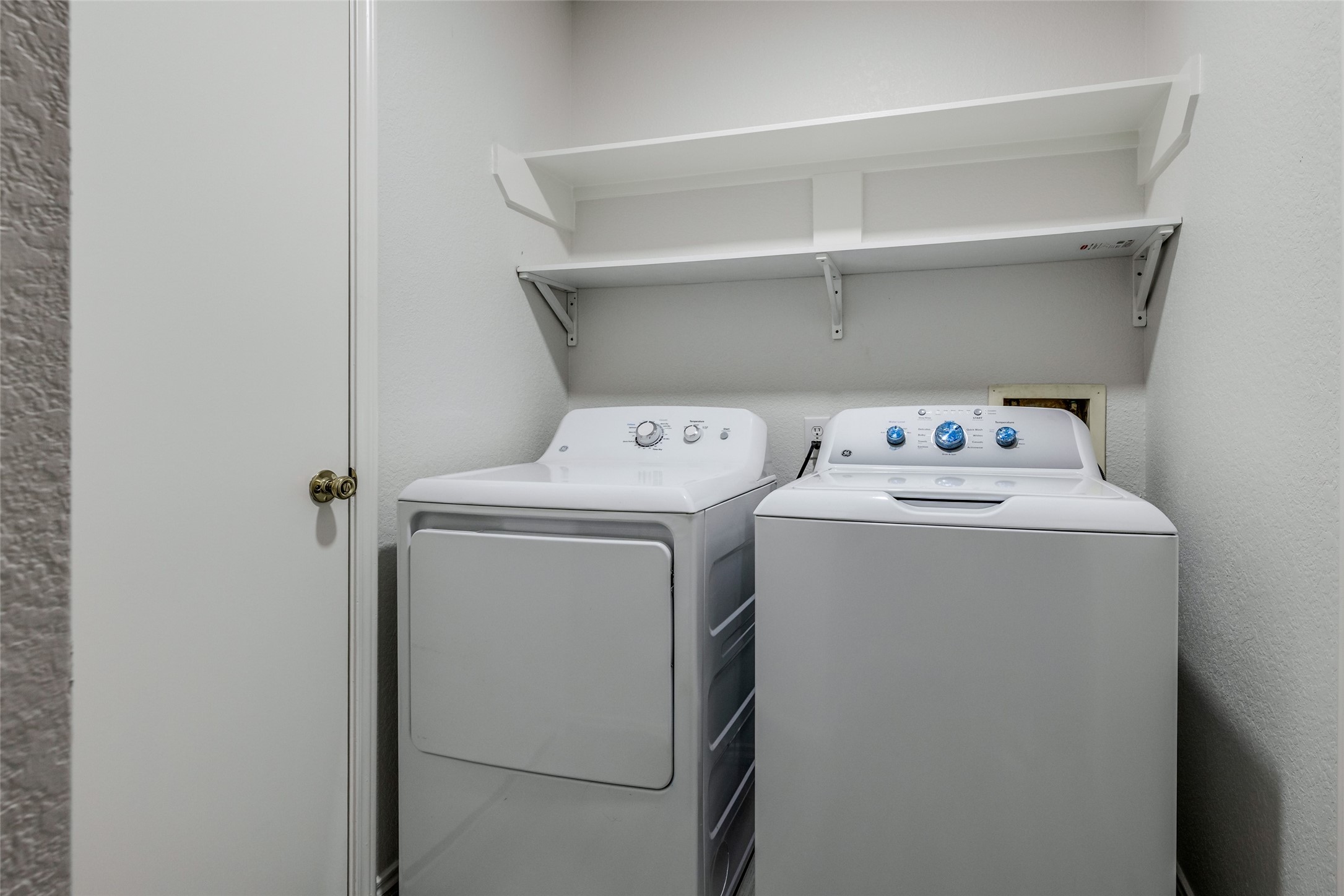 5750 Roehampton Court Houston, TX 77084 - Photo 23 of 25 a utility room with dryer and washer