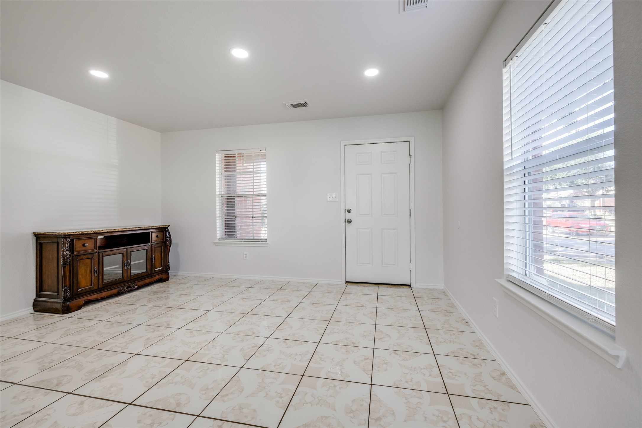 5750 Roehampton Court Houston, TX 77084 - Photo 6 of 25 a view of an empty room with a window