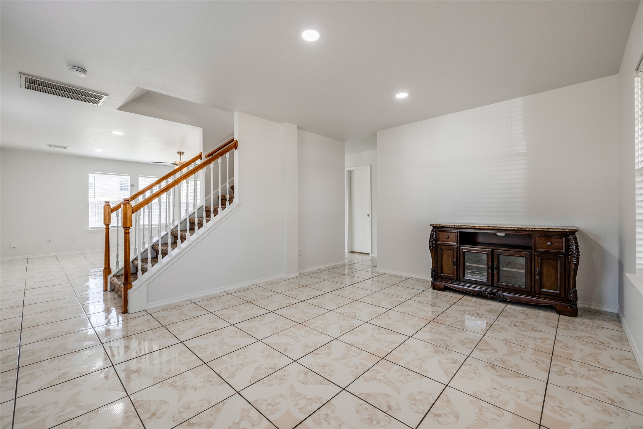 5750 Roehampton Court Houston, TX 77084 - Photo 8 of 25 a view of an entryway with wooden floor