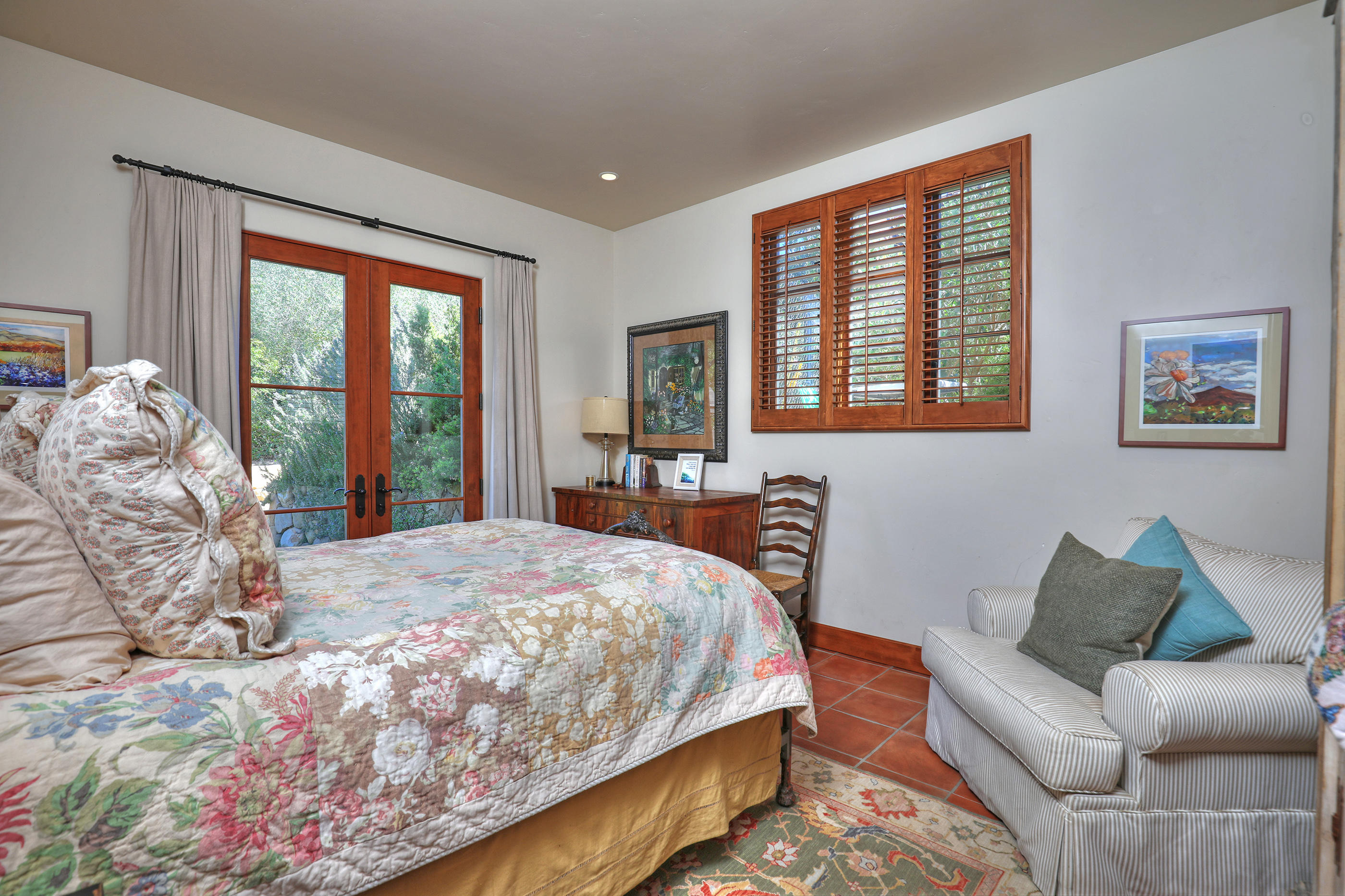 311 Ennisbrook Drive Montecito, CA 93108 - Photo 11 of 31 a bedroom with a large bed and a couch