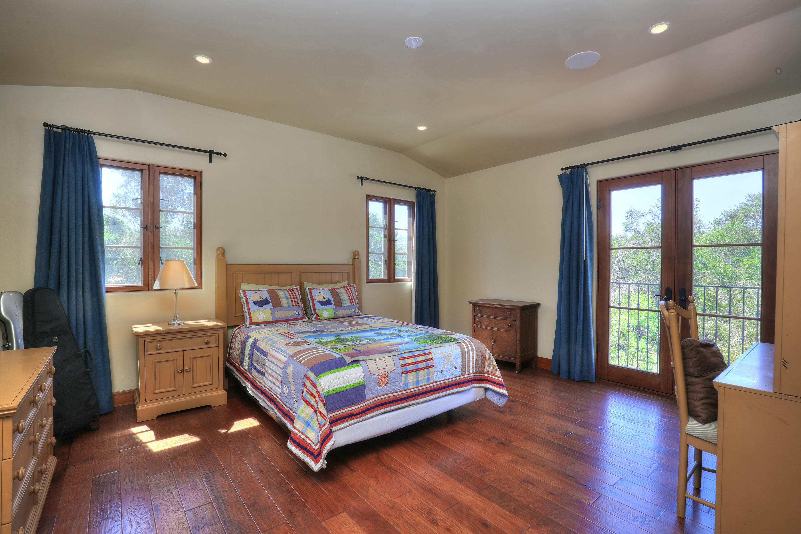 311 Ennisbrook Drive Montecito, CA 93108 - Photo 19 of 31 a bedroom with a large bed and a large window