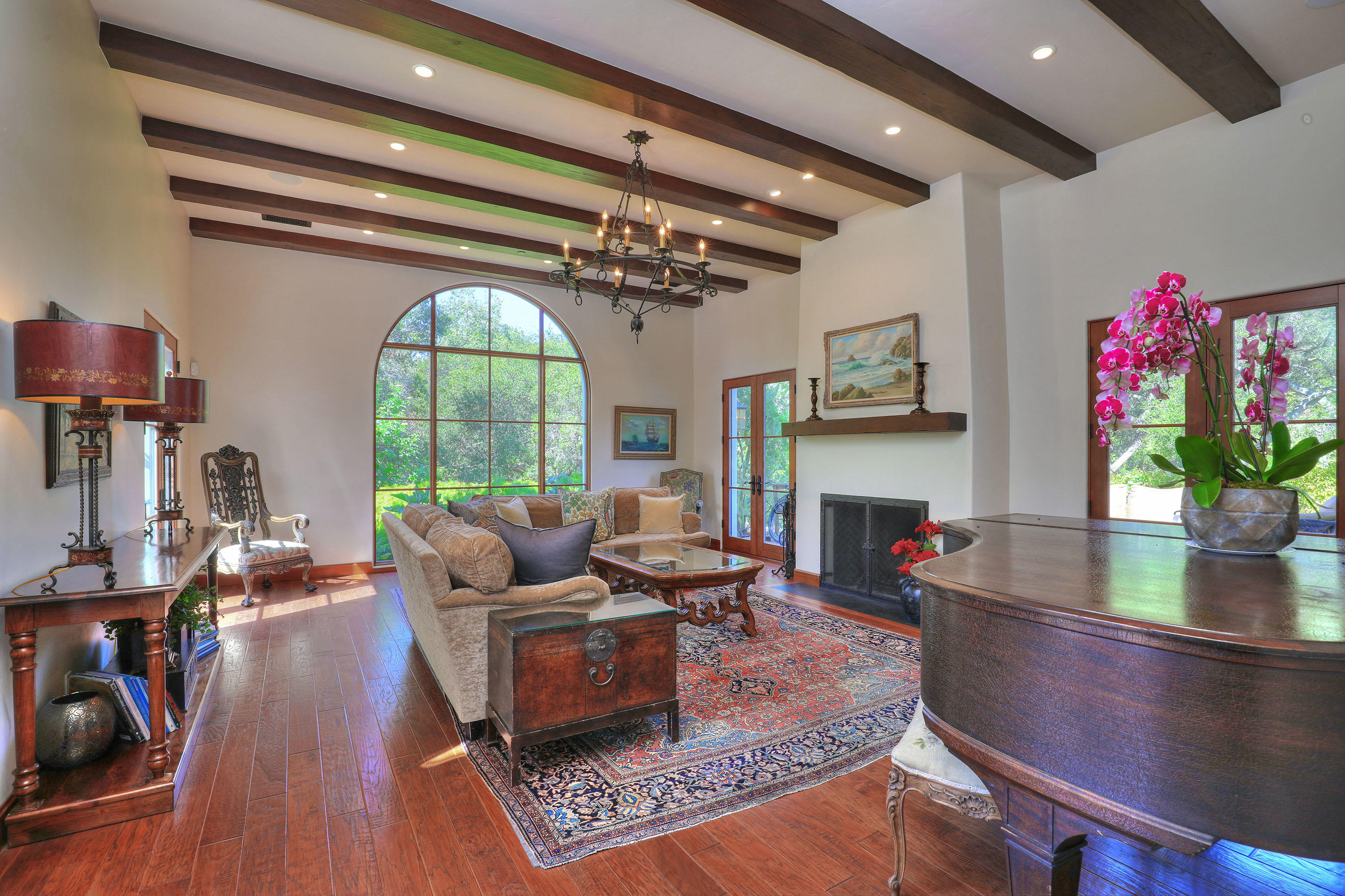 311 Ennisbrook Drive Montecito, CA 93108 - Photo 4 of 31 a living room with fireplace furniture and a large window