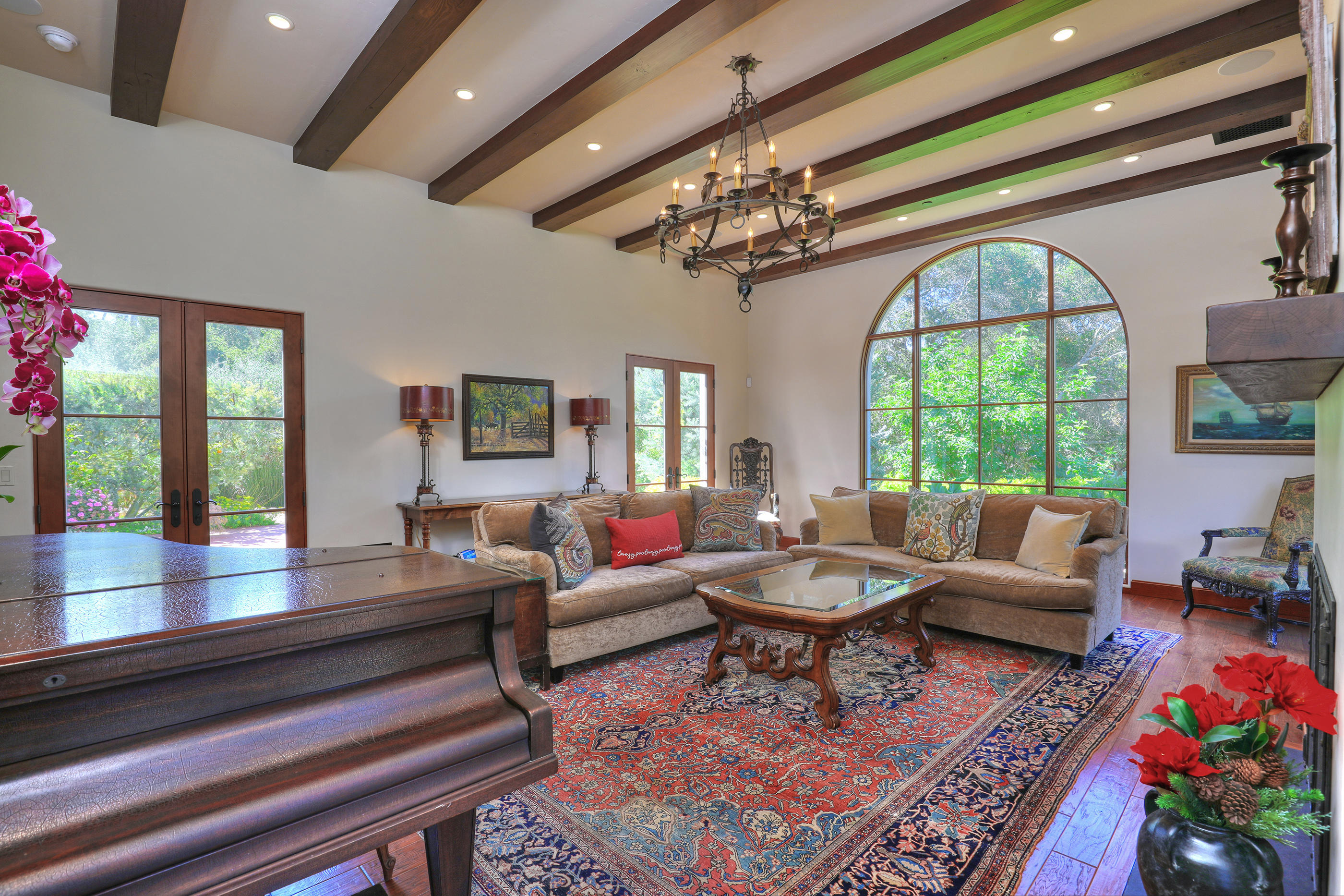 311 Ennisbrook Drive Montecito, CA 93108 - Photo 5 of 31 a living room with furniture a chandelier and a rug