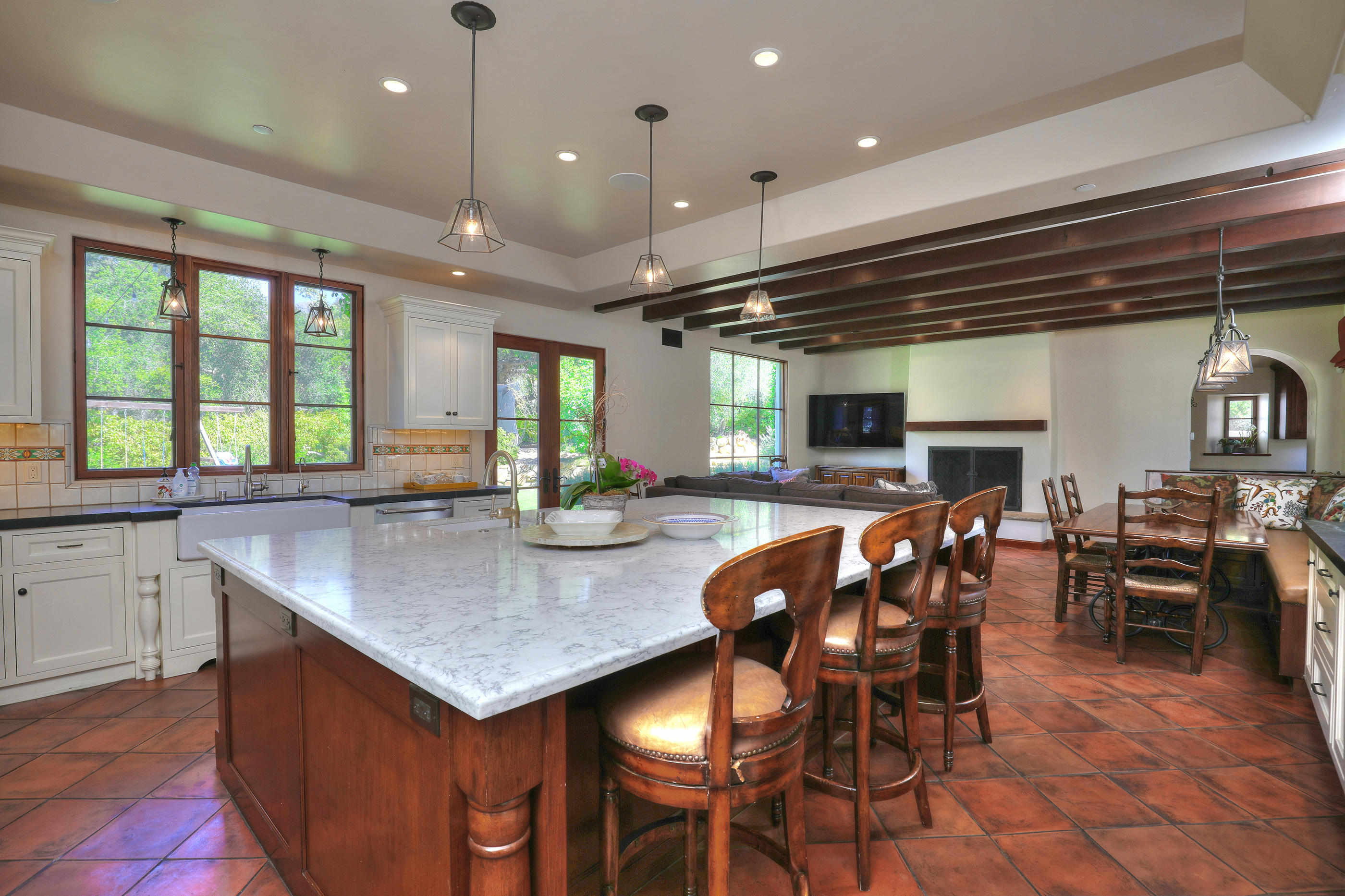 311 Ennisbrook Drive Montecito, CA 93108 - Photo 8 of 31 a kitchen with a table and chairs in it