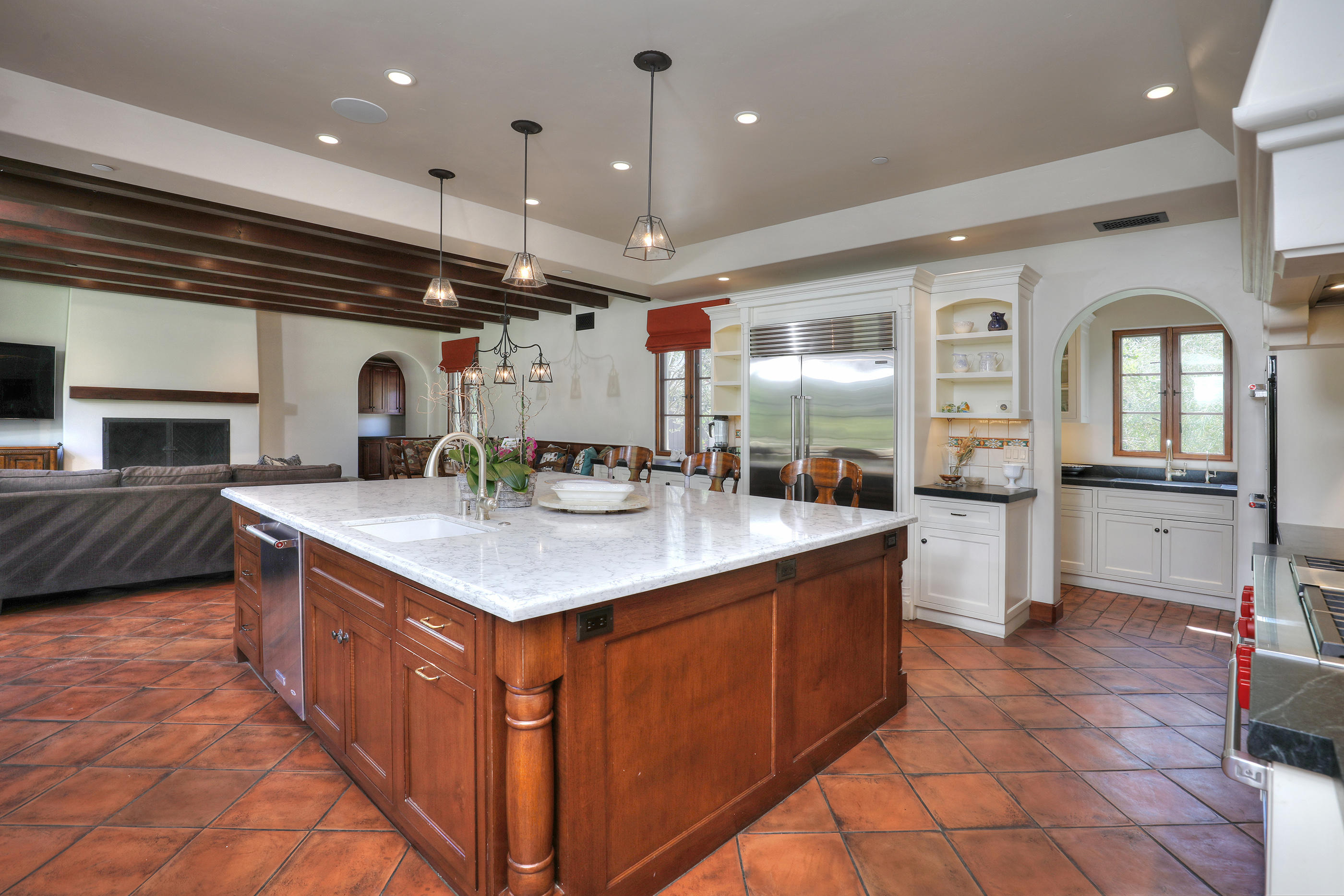 311 Ennisbrook Drive Montecito, CA 93108 - Photo 9 of 31 a kitchen with stainless steel appliances granite countertop a sink and cabinets