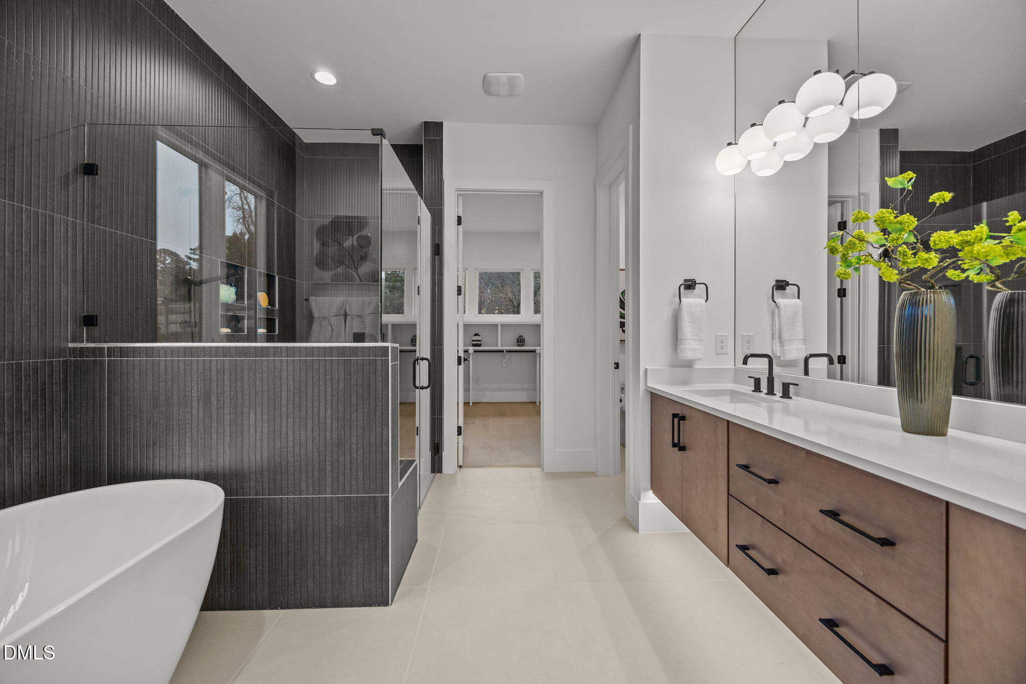 861 Wimbleton Drive Raleigh, NC 27609 - Photo 28 of 64 a spacious bathroom with a granite countertop sink a toilet and shower
