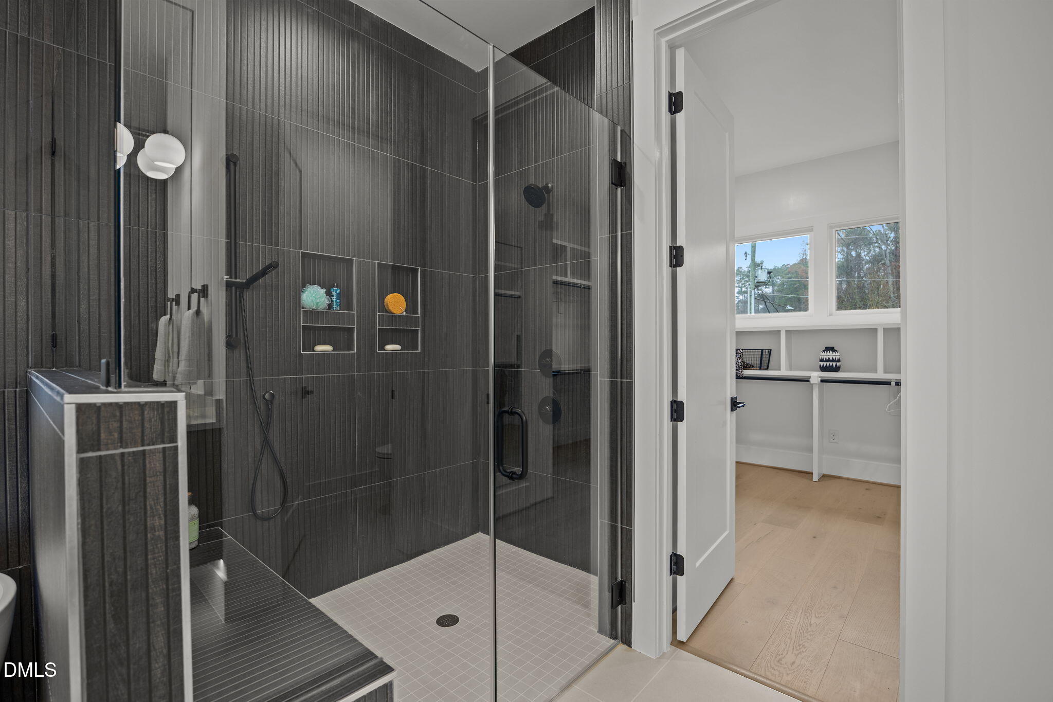 861 Wimbleton Drive Raleigh, NC 27609 - Photo 29 of 64 a bathroom with a shower and a sink