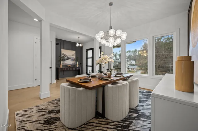 a kitchen with sink stove and cabinets