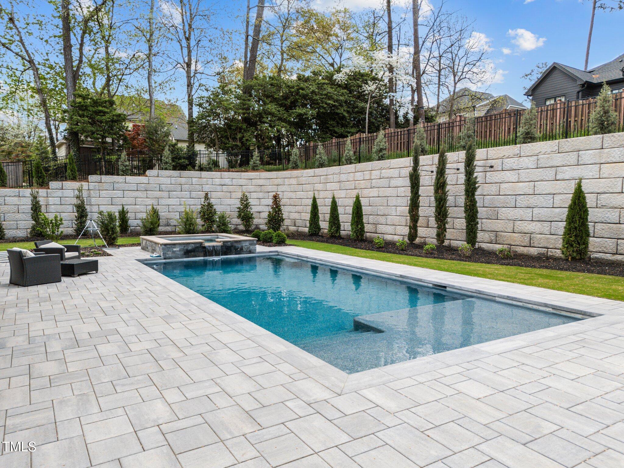 861 Wimbleton Drive Raleigh, NC 27609 - Photo 55 of 64 a view of swimming pool with chairs