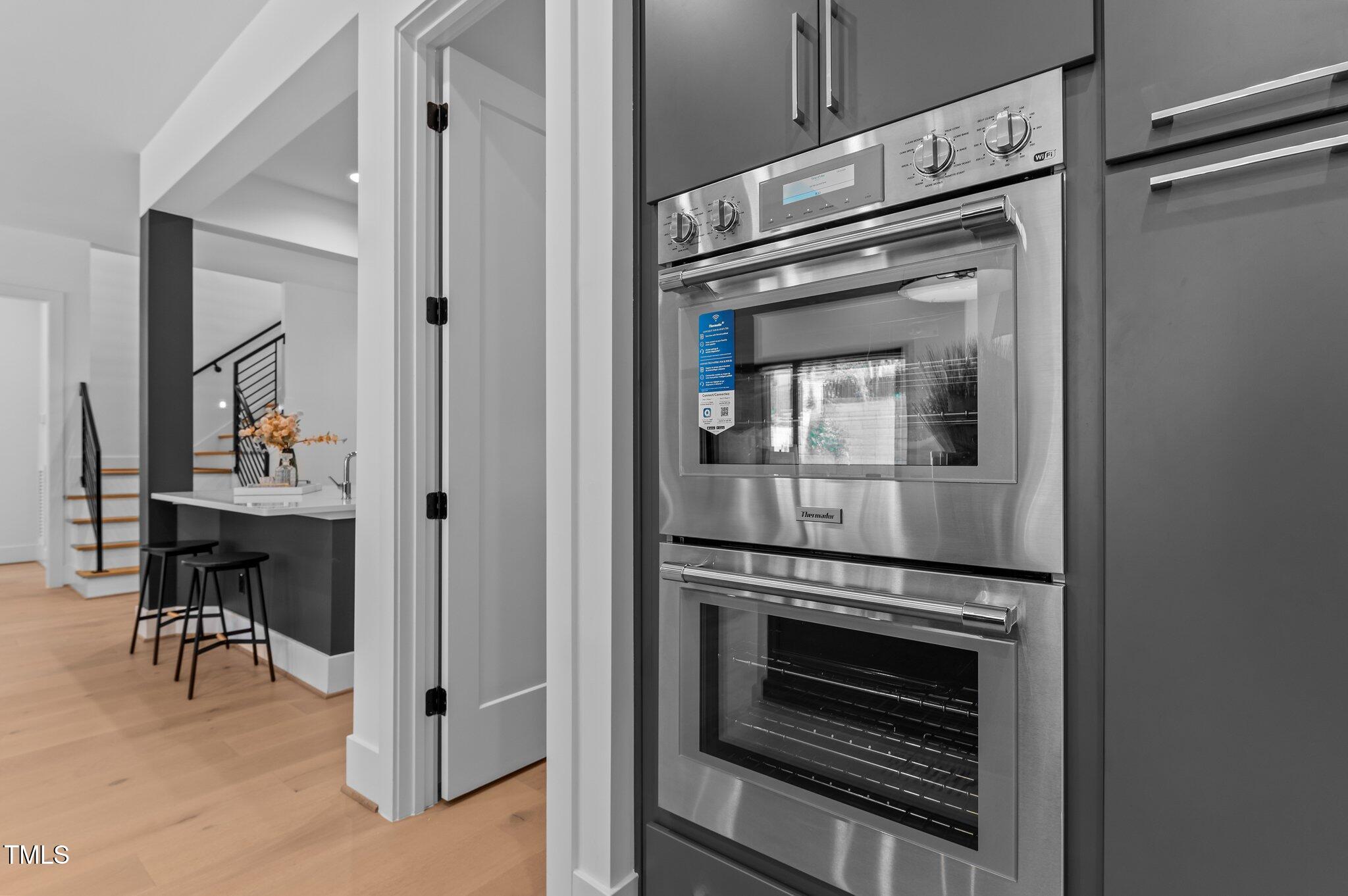 861 Wimbleton Drive Raleigh, NC 27609 - Photo 10 of 62 a kitchen with a stove and a refrigerator