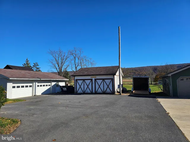 a view of a house with a street