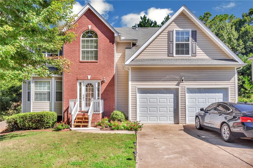 56 Birchfield Court Dallas, GA 30132 - Photo 1 of 1 a view of front a house with a yard
