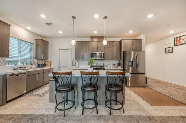 a bathroom with a sink and a window
